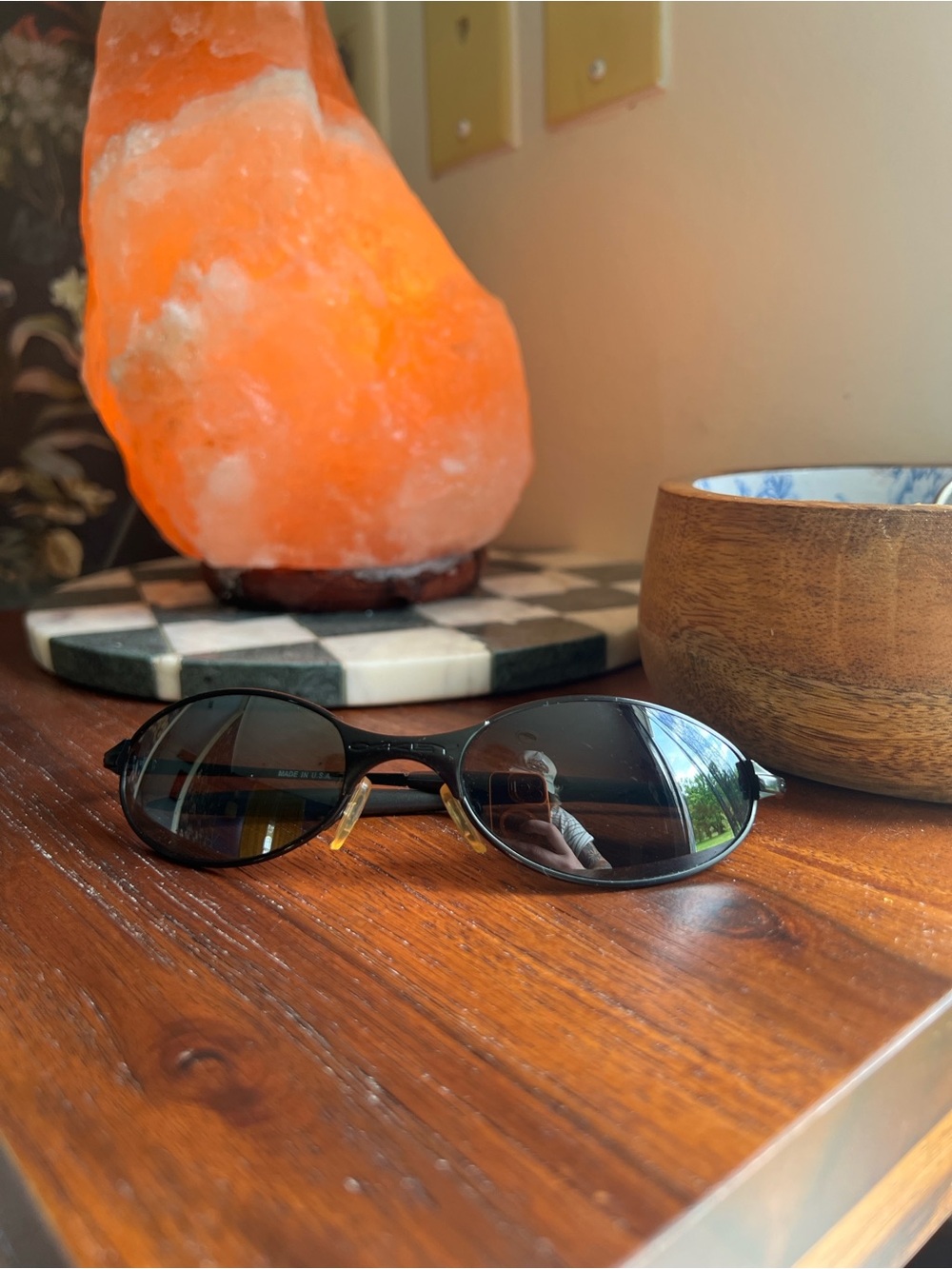 Oakley Black Oval Sunglasses with Dark Lenses